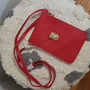 NWOT Red faux leather cross body bag with gold accents❤️ Never used